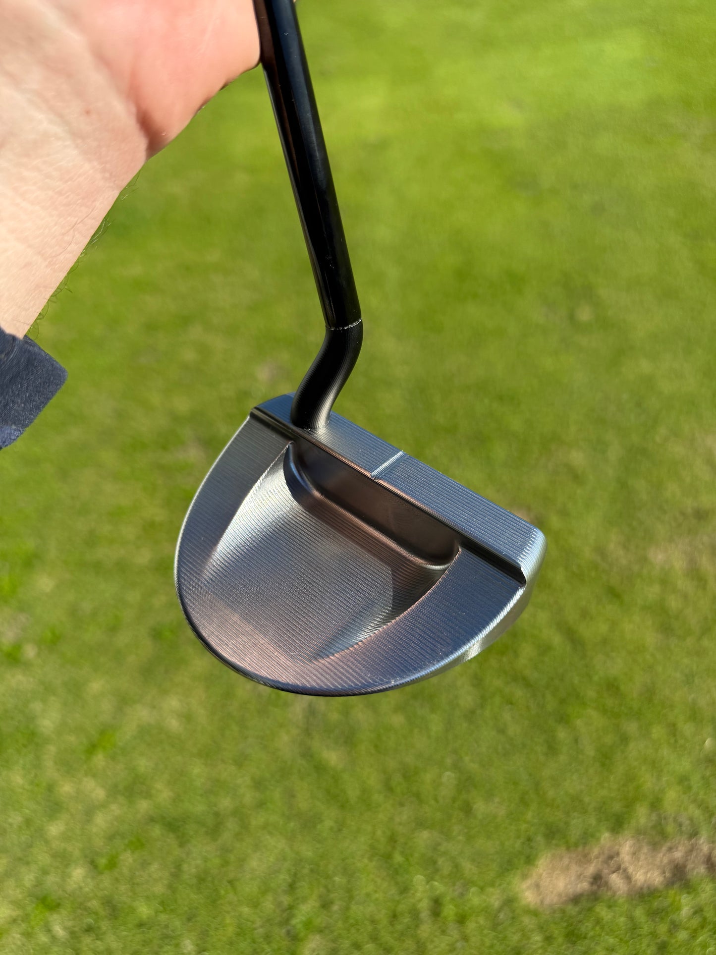 Stainless mallet putter