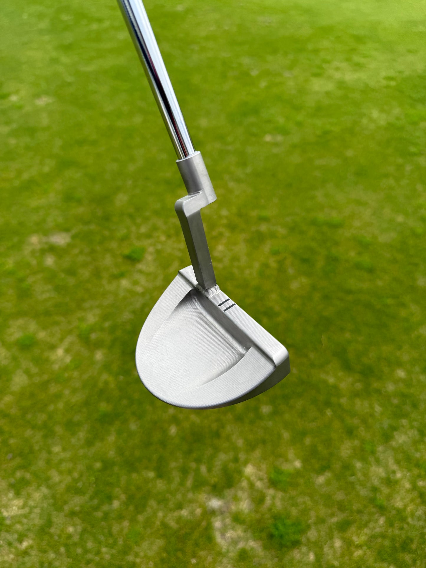Stainless mallet putter