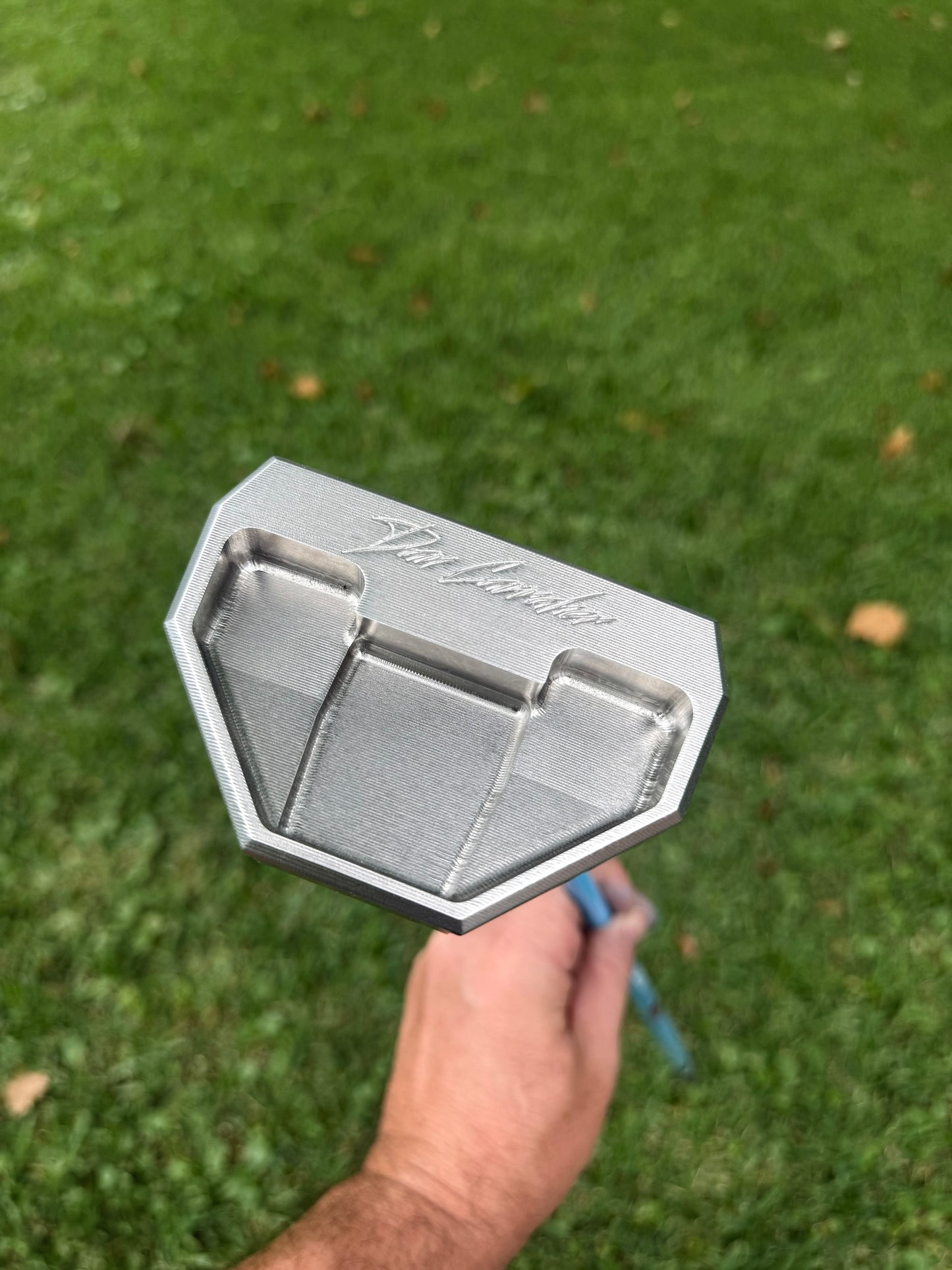 Stainless mallet putter